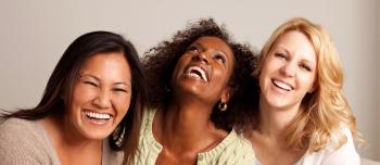 Three women smiling together Three women smiling together