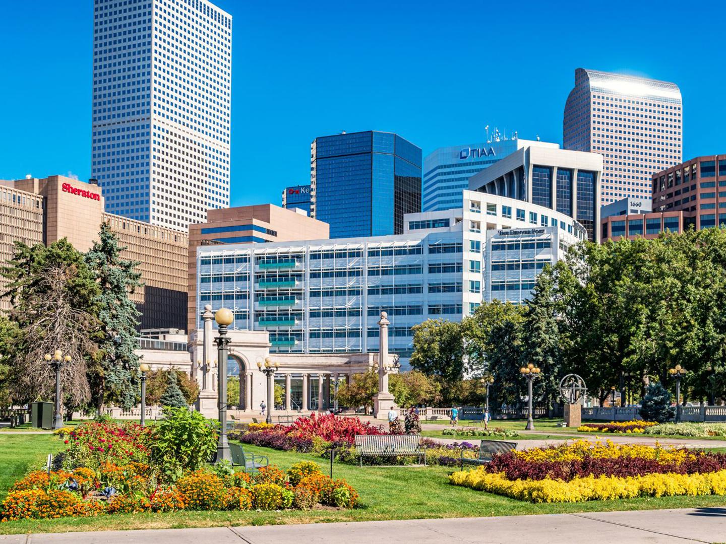 A park and city skyline in Denver, Colorado